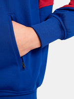 FC Barcelona retro-style jacket in blue and red with gold Nike logo and crest.
