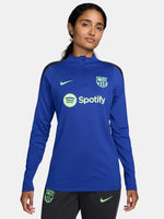 Women's FC Barcelona long-sleeve training top in vibrant royal blue with black shoulder accents, featuring light green Nike, Spotify, and club logos on the chest.