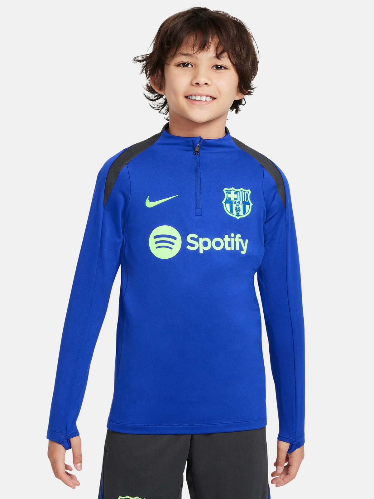 Blue FC Barcelona quarter-zip training top with neon green logos and black shoulder accents.