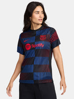 FC Barcelona warm-up shirt featuring a black base with a striking vertical stripe pattern in alternating red and blue. The shirt displays the red Spotify logo in the center, along with the Nike swoosh and FC Barcelona crest, also in red.
