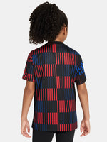 FC Barcelona warm-up shirt featuring a black base with a striking vertical stripe pattern in alternating red and blue. The shirt displays the red Spotify logo in the center, along with the Nike swoosh and FC Barcelona crest, also in red.
