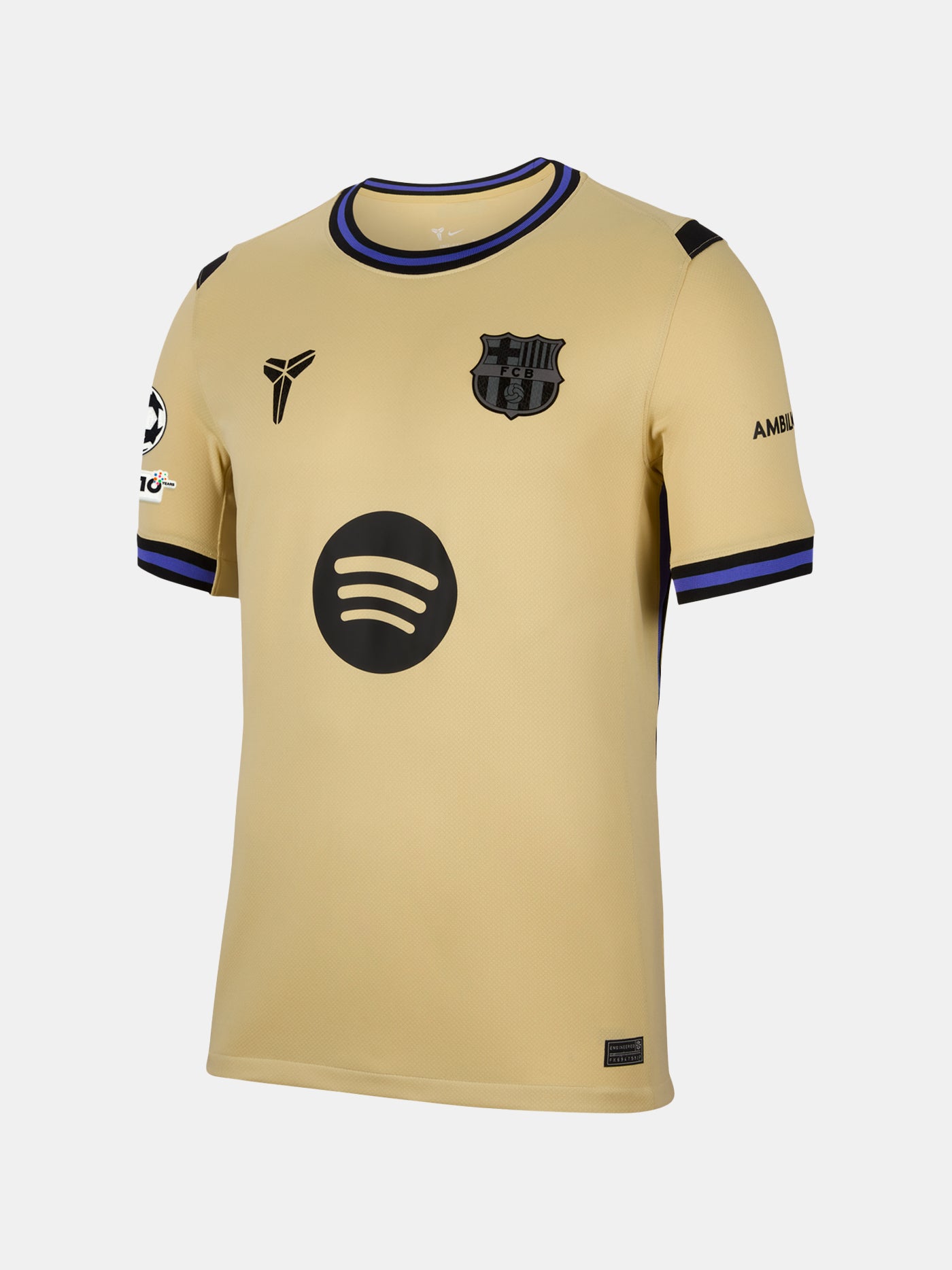 Beige sports jersey with black logo and branding on a white background