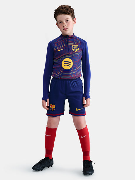 Classic Barça shorts in deep navy with red accents and yellow swoosh. Game-ready essentials.
