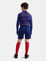 Classic Barça shorts in deep navy with red accents and yellow swoosh. Game-ready essentials.
