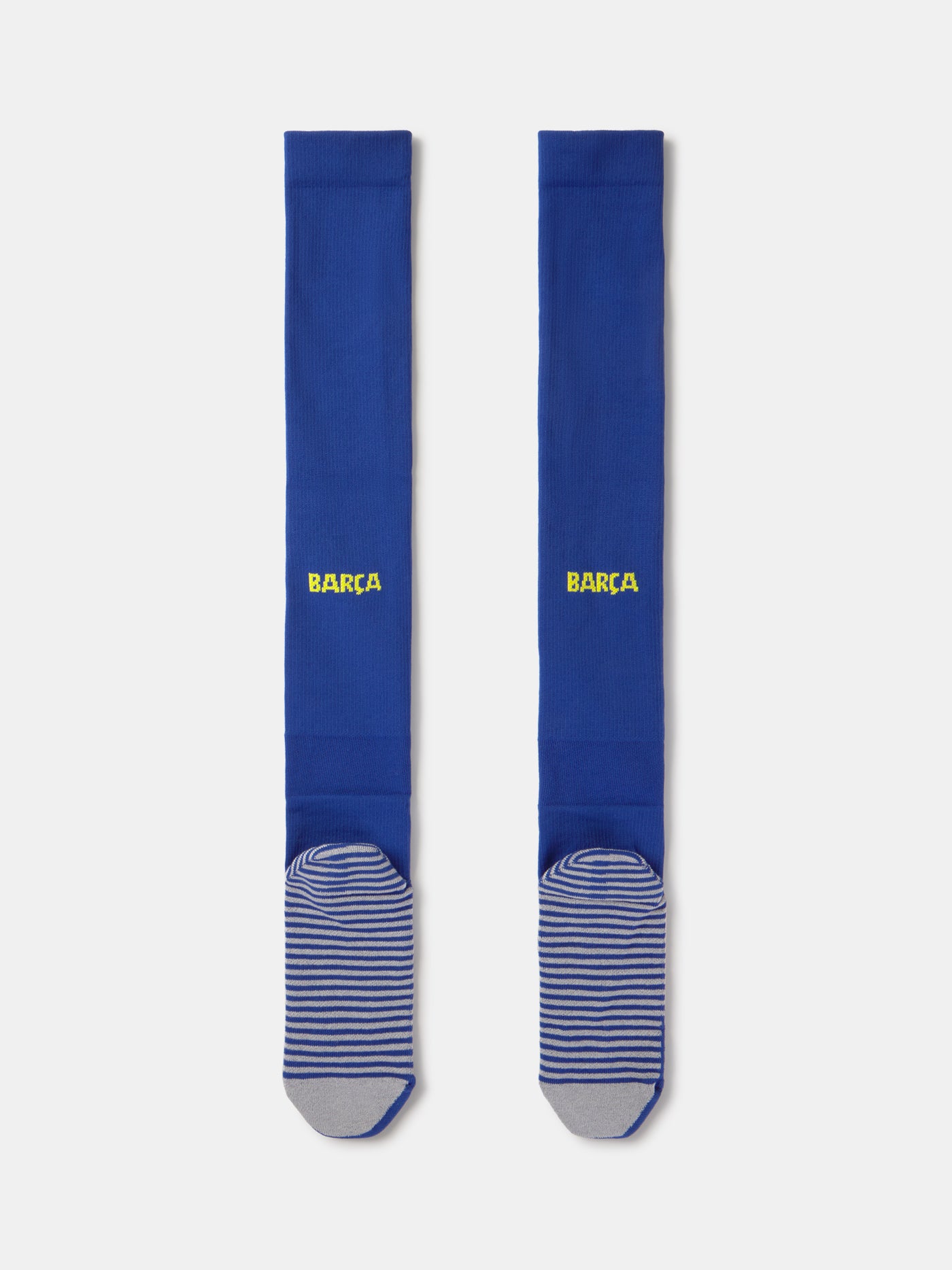Blue Nike sock with yellow swoosh logo on a white background