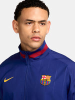 Blue Anthem Jacket with yellow Nike logo