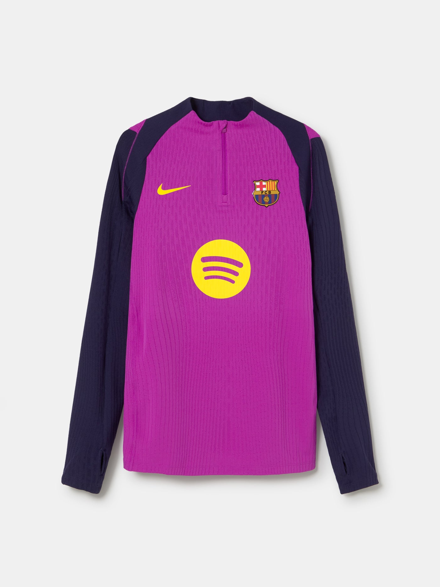 Purple and navy FC Barcelona Nike training top with long sleeves, featuring yellow swoosh, club crest, and Spotify logo on the front.