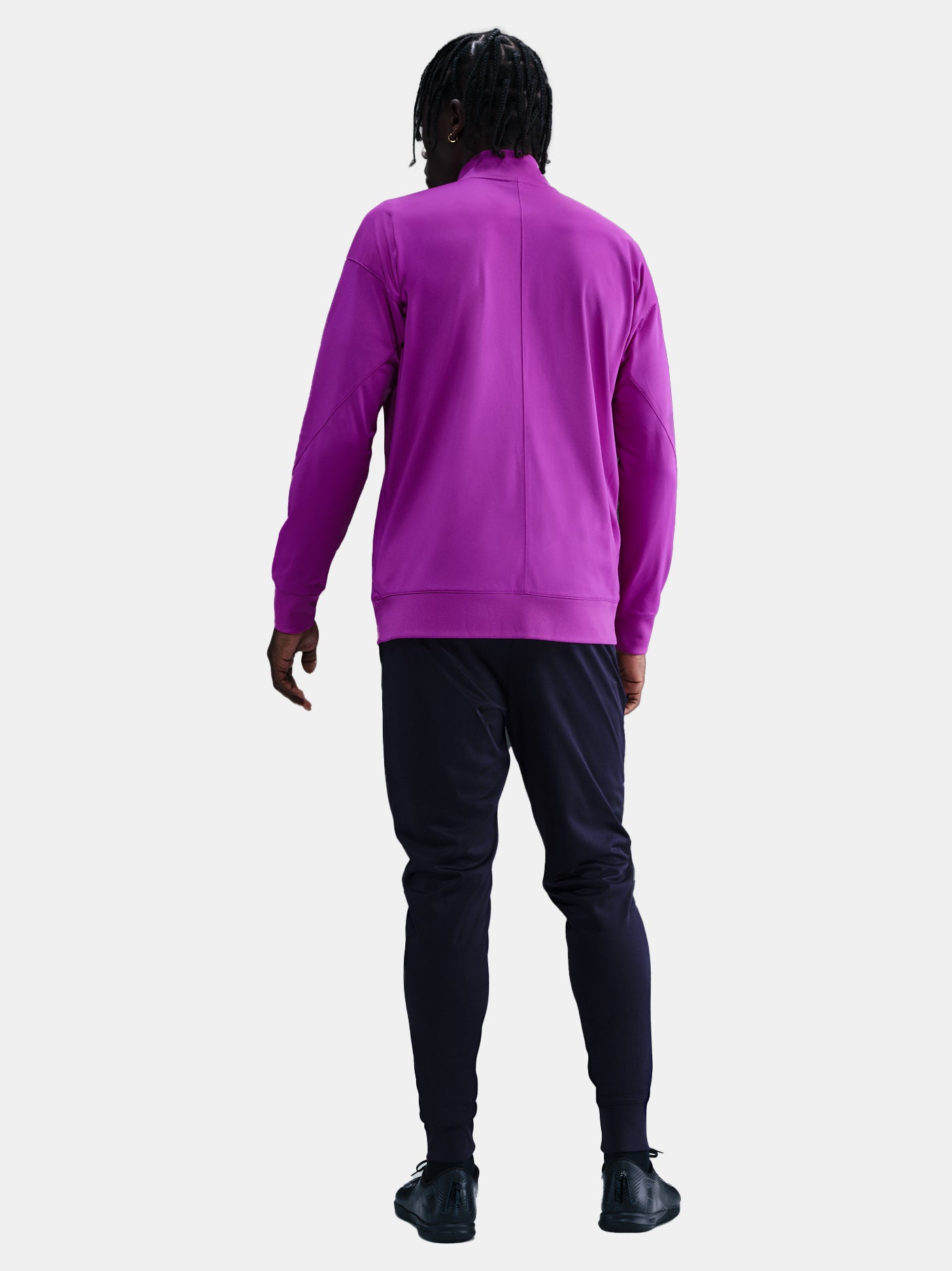 FC Barcelona 25/26 tracksuit back view showing purple training jacket and navy tapered pants
