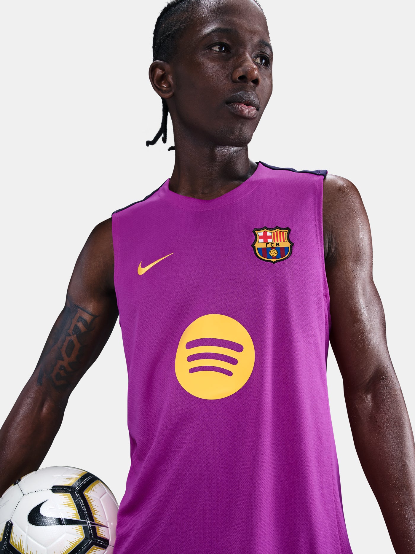 Purple FC Barcelona tank with yellow Nike logo, club crest, and Spotify sponsor on the front.