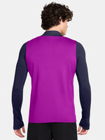Purple FC Barcelona training top with quarter-zip, navy sleeves, yellow Nike logo, club crest, and Spotify sponsor on the front