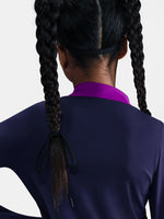 FC Barcelona long-sleeve training top for kids, in deep navy with vibrant magenta shoulder accents. Features include a half-zip design, yellow Nike swoosh, the Spotify sponsor logo, and the club crest prominently displayed—designed for comfort and performance on the pitch.
