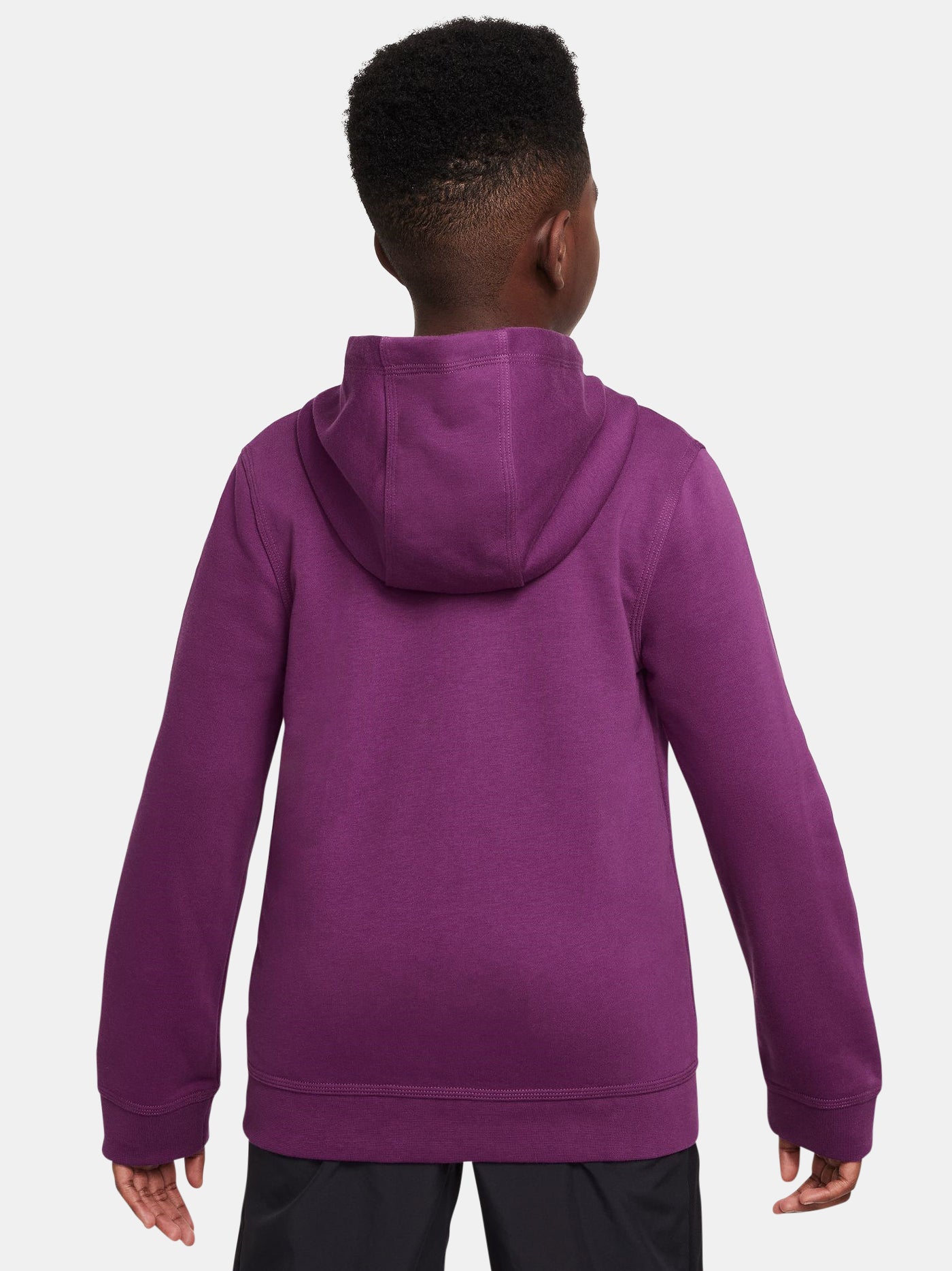 Child wearing a purple hoodie on a white background