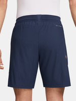 FC Barcelona navy blue training shorts with coral Nike logo and club crest