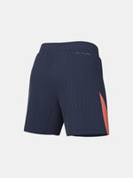 FC Barcelona navy blue training shorts with coral Nike logo and club crest