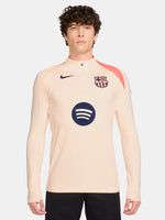 FC Barcelona long-sleeve peach training top with navy Nike logo, club crest, Spotify sponsor, and coral shoulder detail