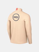 FC Barcelona long-sleeve peach training top with navy Nike logo, club crest, Spotify sponsor, and coral shoulder detail