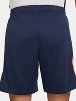 FC Barcelona navy blue training shorts with coral Nike logo and club crest