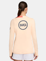 FC Barcelona long-sleeve peach training top with navy Nike logo, club crest, Spotify sponsor, and coral shoulder detail