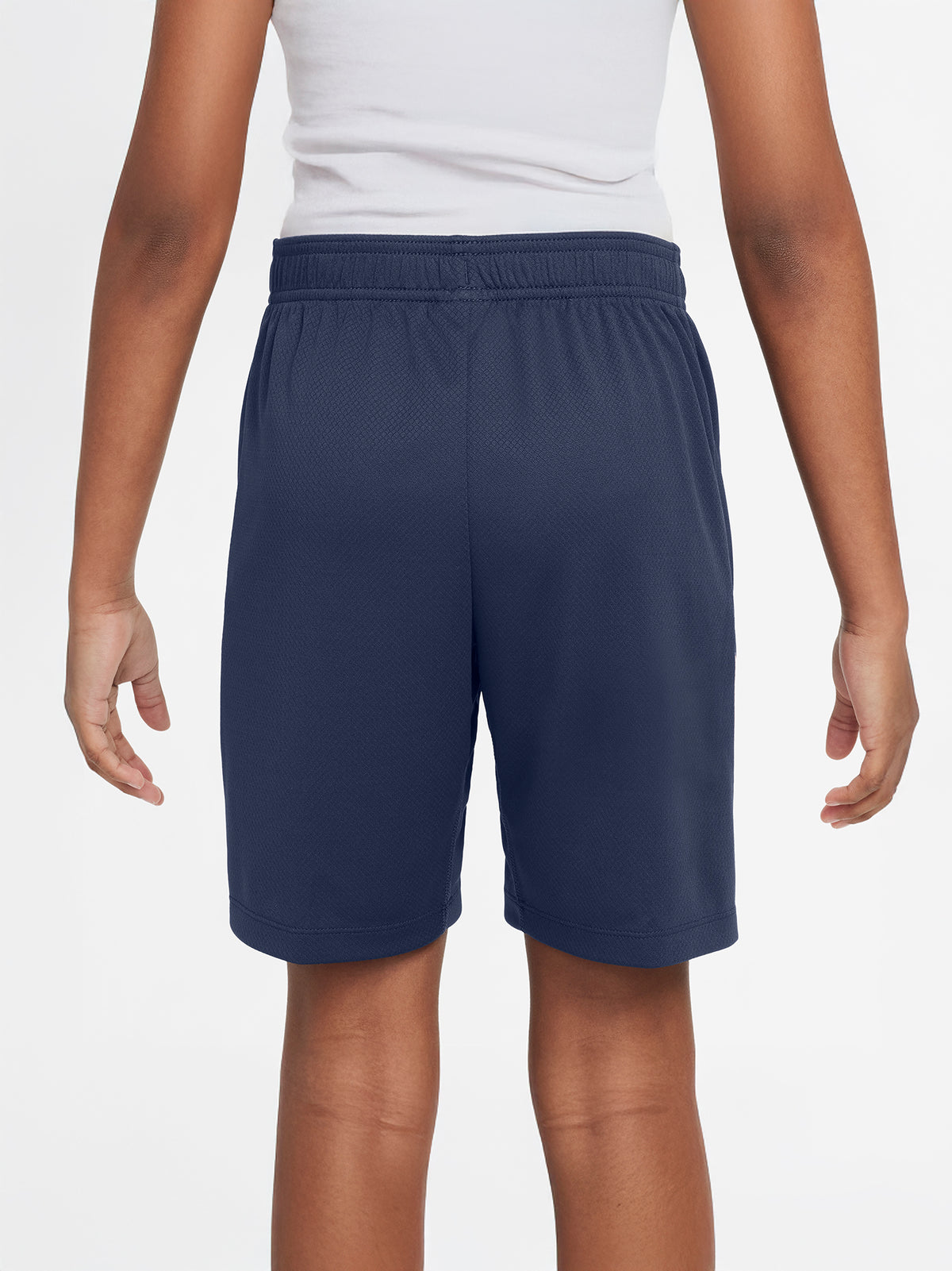 FC Barcelona navy blue training shorts with coral Nike logo and club crest