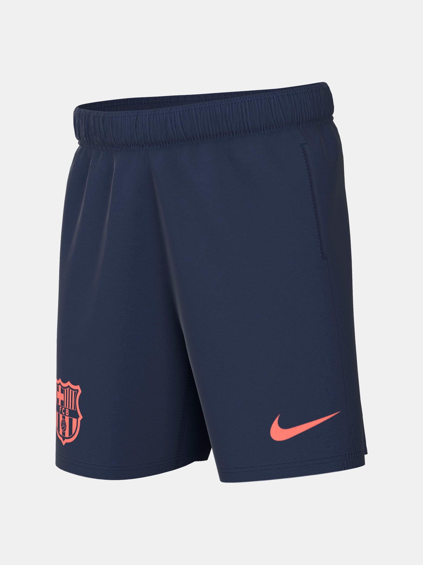 FC Barcelona navy blue training shorts with coral Nike logo and club crest