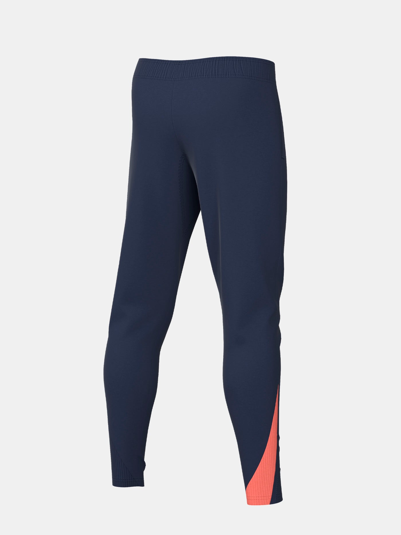 FC Barcelona navy blue training pants with slim fit, featuring the club crest and Nike logo in coral on the front