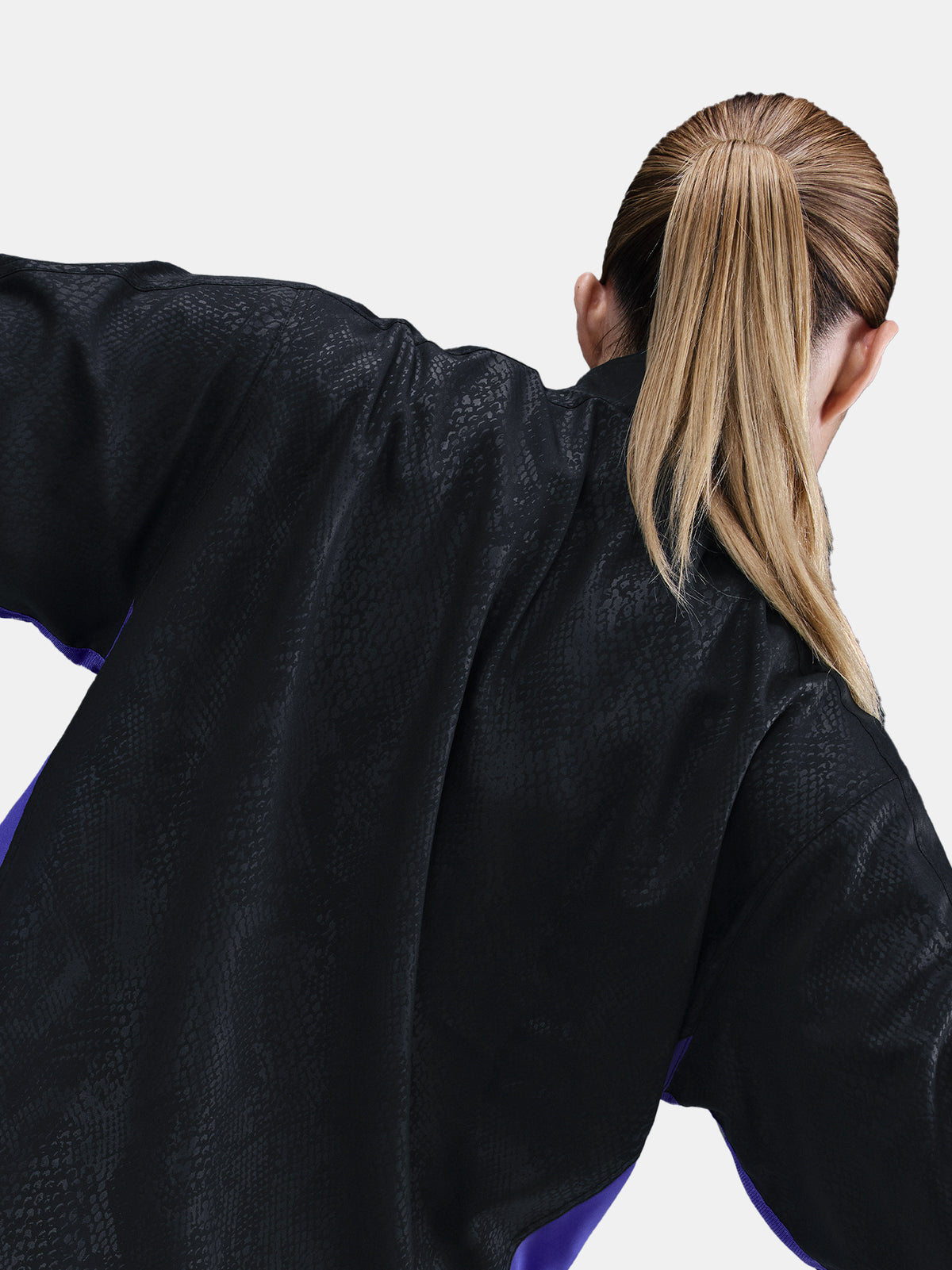 Black FC Barcelona jacket with a subtle textured pattern, featuring the Kobe Bryant logo on the left chest and the FC Barcelona crest in purple on the right chest