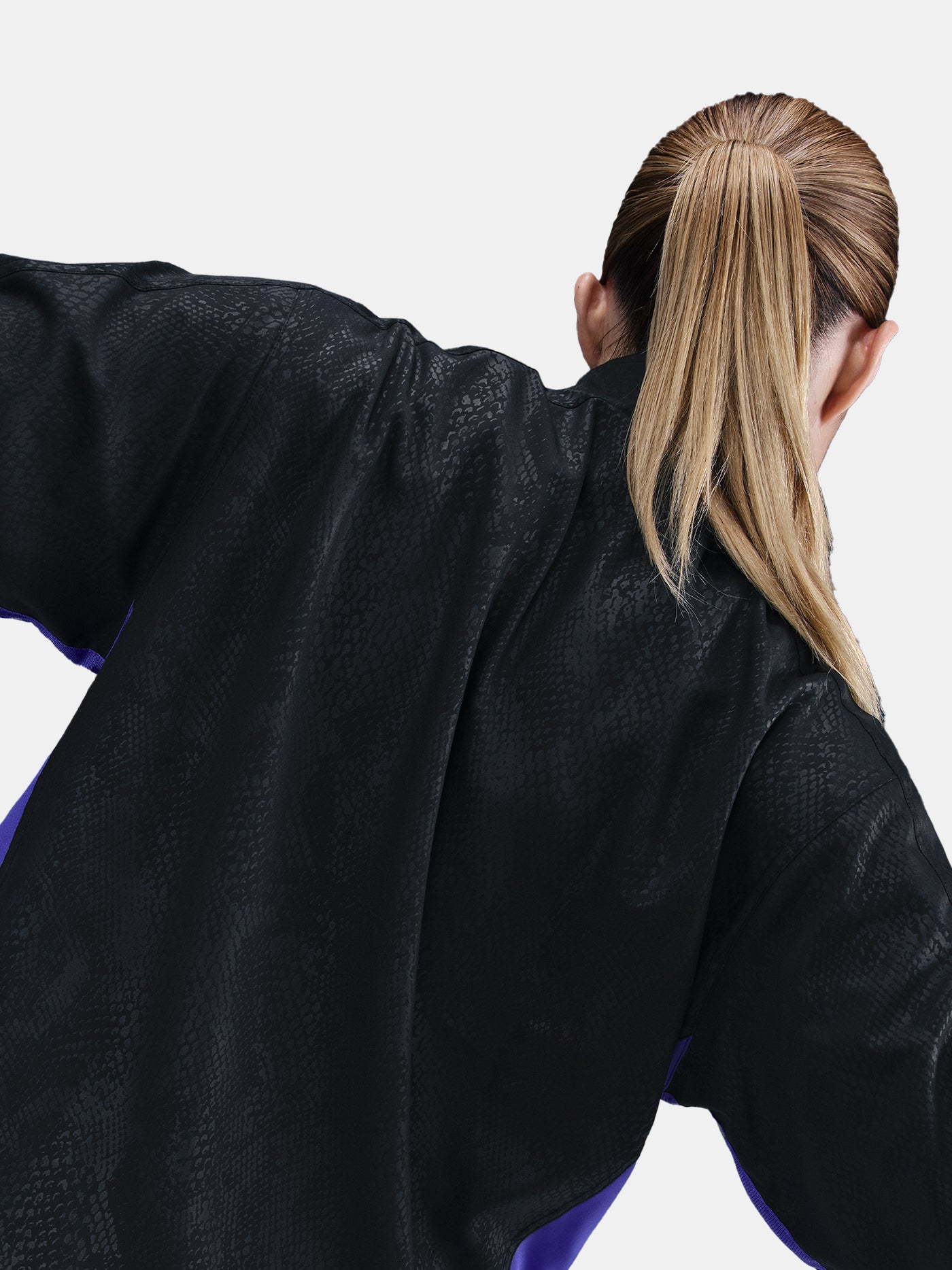 Black FC Barcelona jacket with a subtle textured pattern, featuring the Kobe Bryant logo on the left chest and the FC Barcelona crest in purple on the right chest