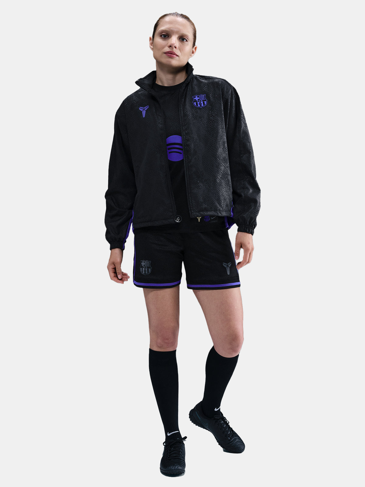 Black FC Barcelona jacket with a subtle textured pattern, featuring the Kobe Bryant logo on the left chest and the FC Barcelona crest in purple on the right chest