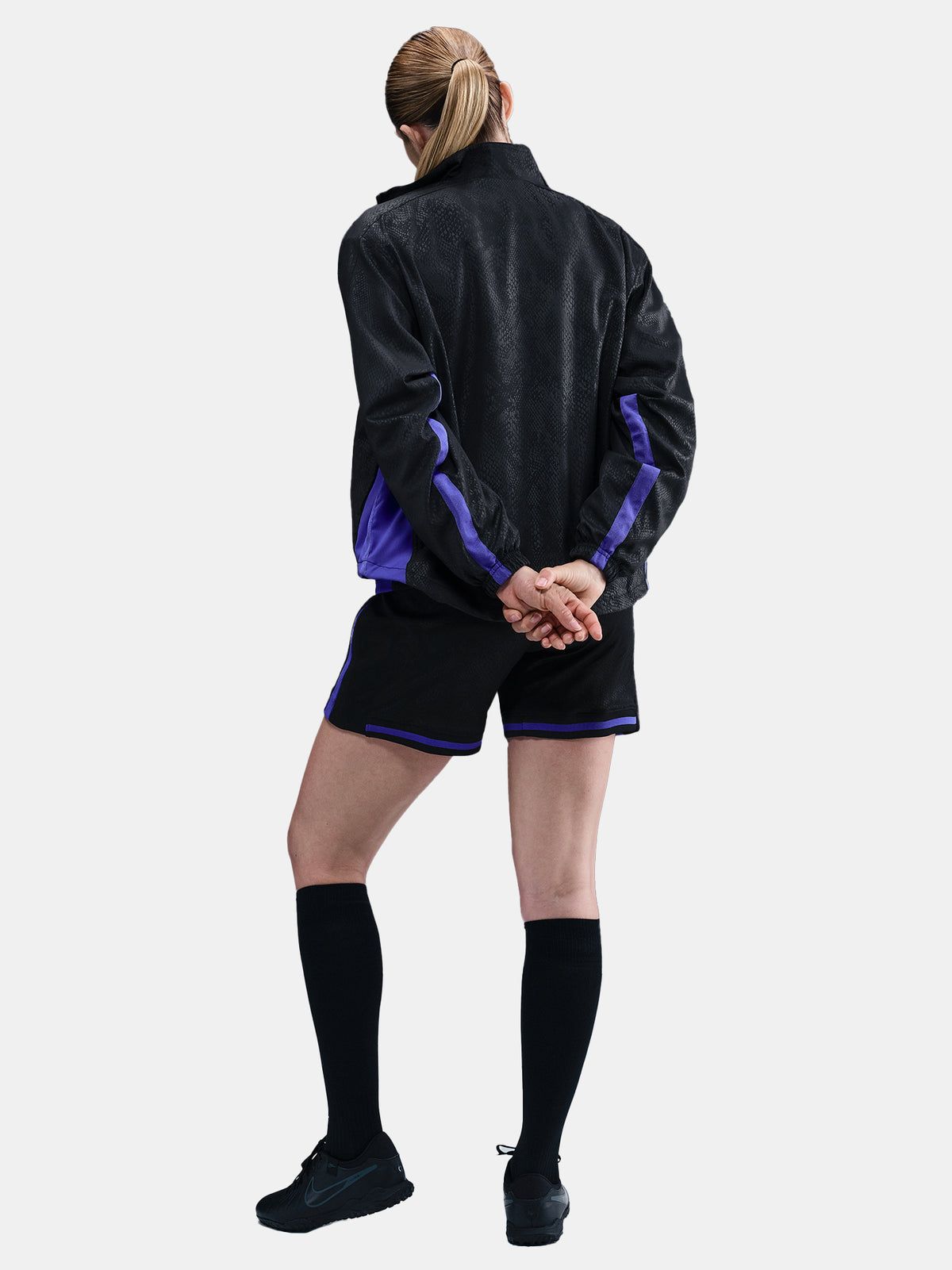 Black FC Barcelona jacket with a subtle textured pattern, featuring the Kobe Bryant logo on the left chest and the FC Barcelona crest in purple on the right chest