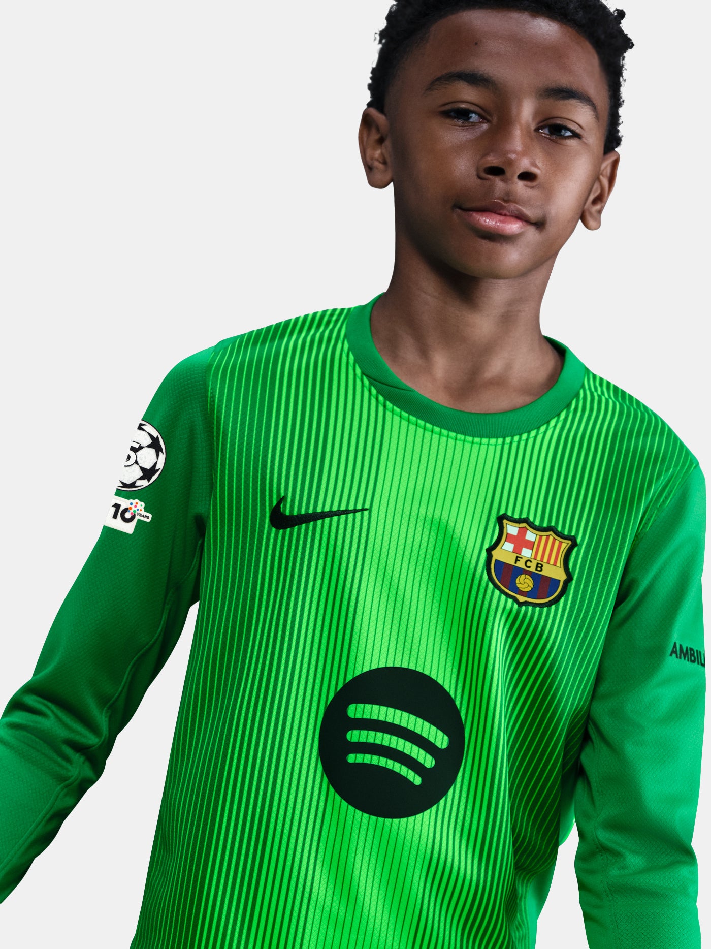 Barça goalkeeper jersey in vivid green with vertical black pinstripes. Fearless style for Goalkeepers.