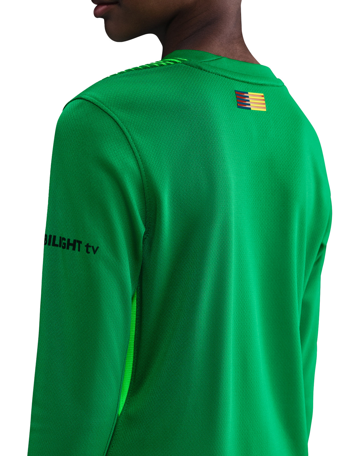 Barça goalkeeper jersey in vivid green with vertical black pinstripes. Fearless style for Goalkeepers.