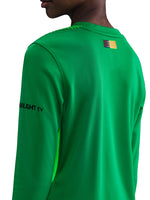Barça goalkeeper jersey in vivid green with vertical black pinstripes. Fearless style for Goalkeepers.
