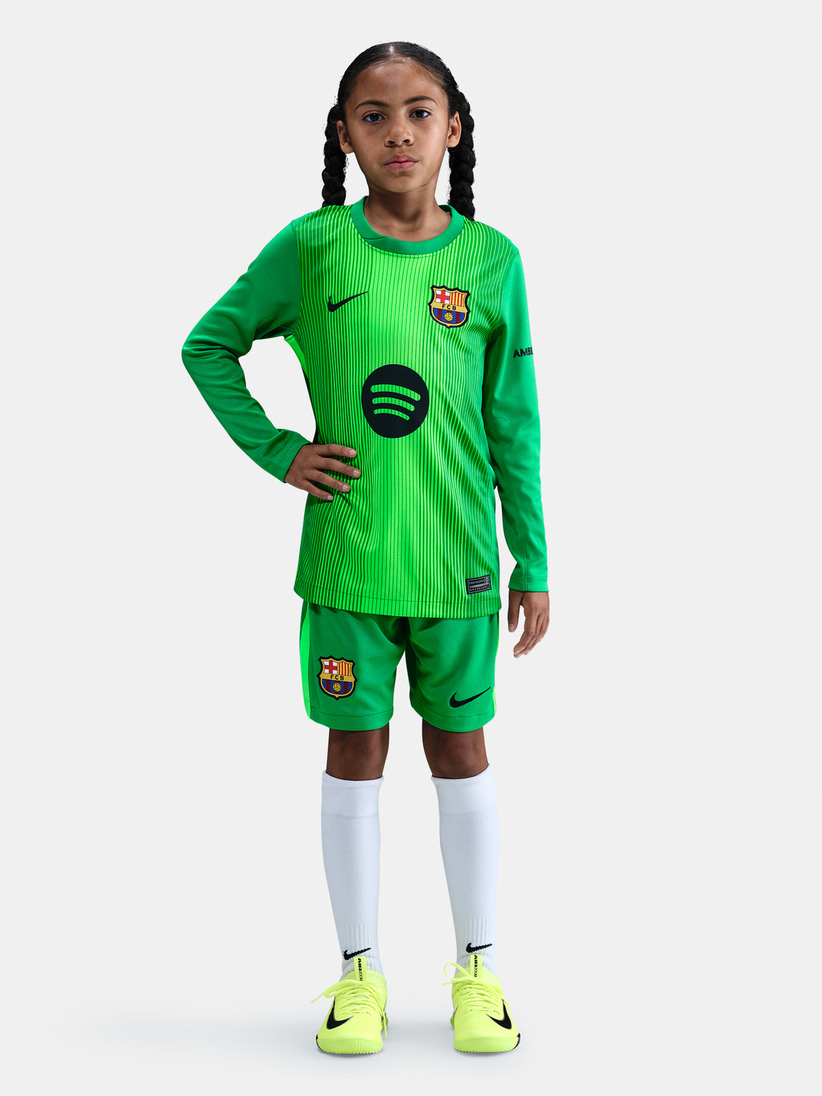 Matching green goalkeeper shorts with Barça crest and Nike swoosh. 