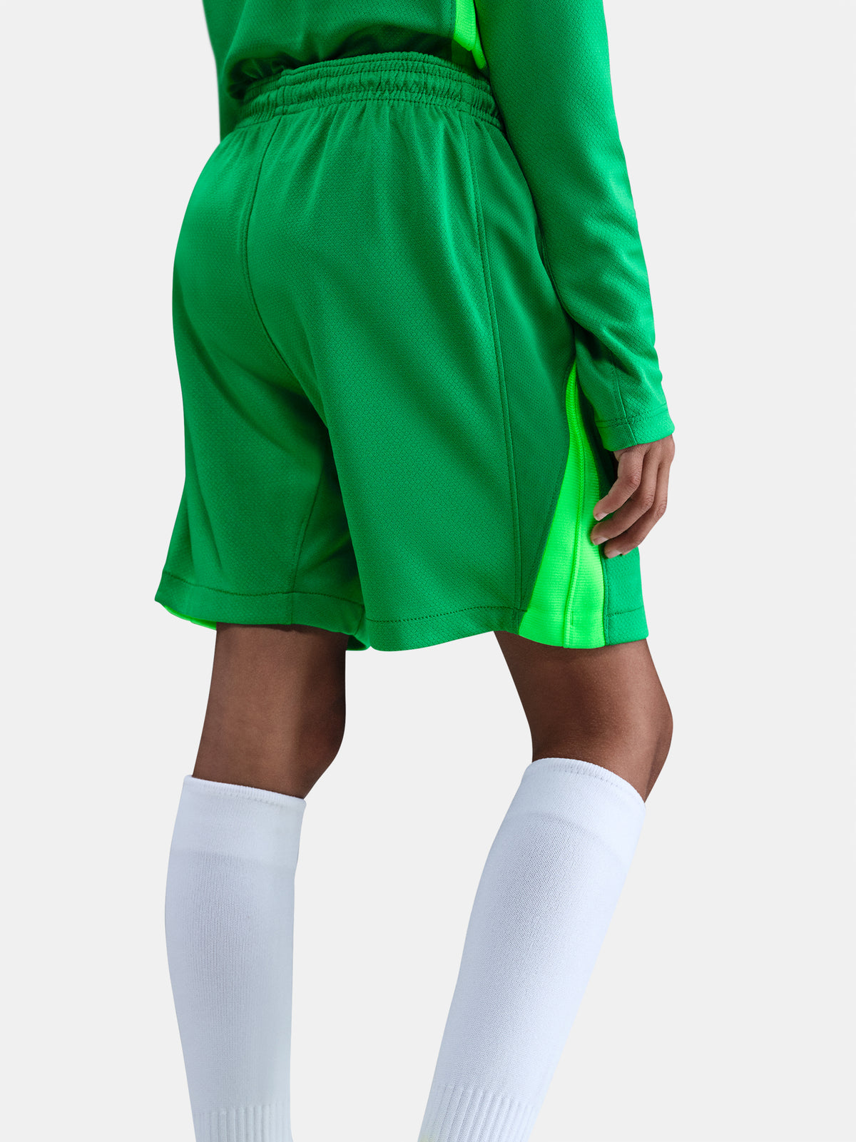 Matching green goalkeeper shorts with Barça crest and Nike swoosh. 