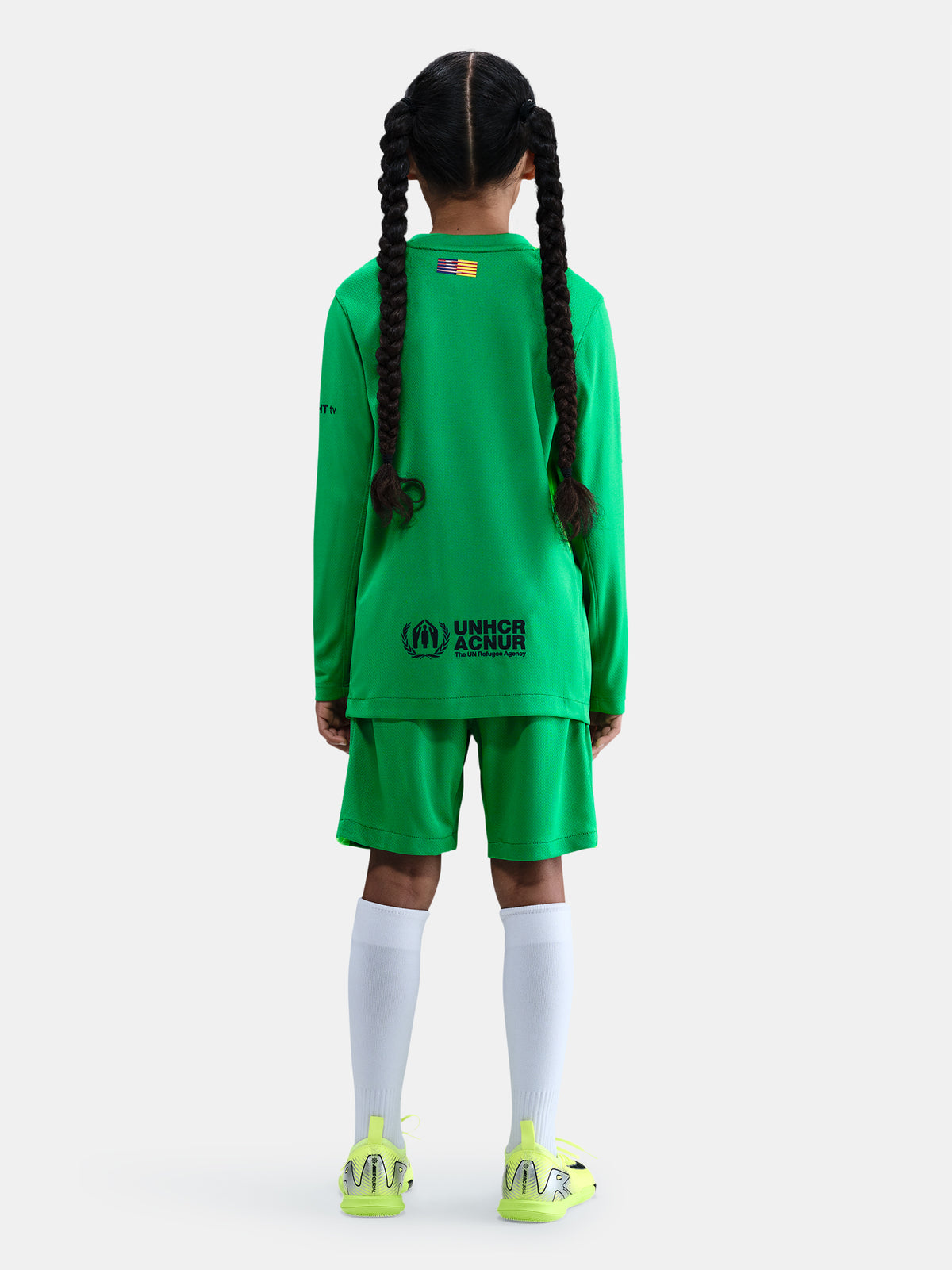 Matching green goalkeeper shorts with Barça crest and Nike swoosh. 