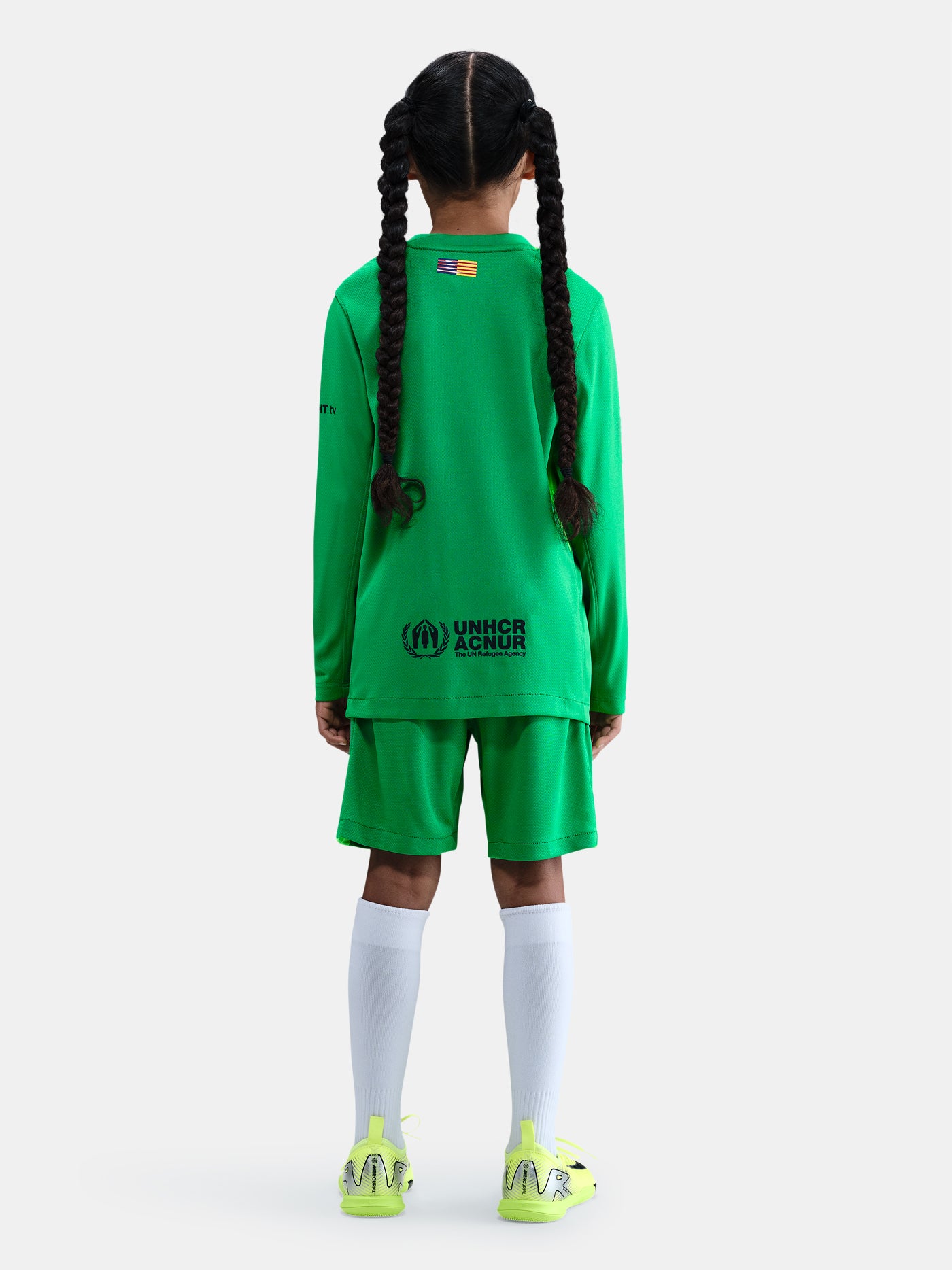 Matching green goalkeeper shorts with Barça crest and Nike swoosh. 
