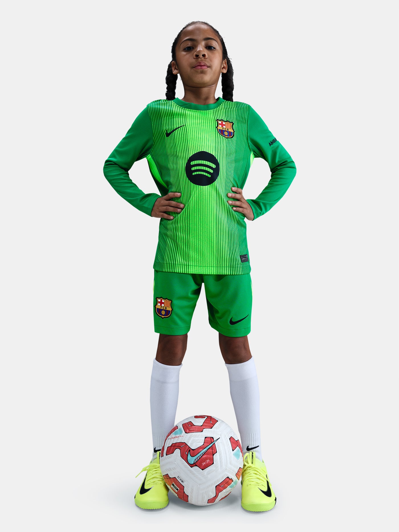 Matching green goalkeeper shorts with Barça crest and Nike swoosh. 