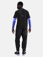 Black FC Barcelona T-shirt with blue Kobe Bryant logo on the chest, paired with black shorts featuring the same emblem.