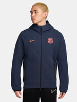 Navy FC Barcelona Nike zip-up hoodie featuring red crest and Nike swoosh on the chest.
