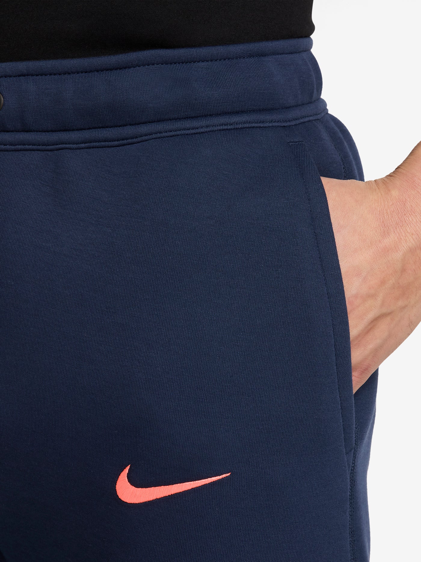 Navy FC Barcelona Nike jogger pants with red crest and Nike swoosh on the front.