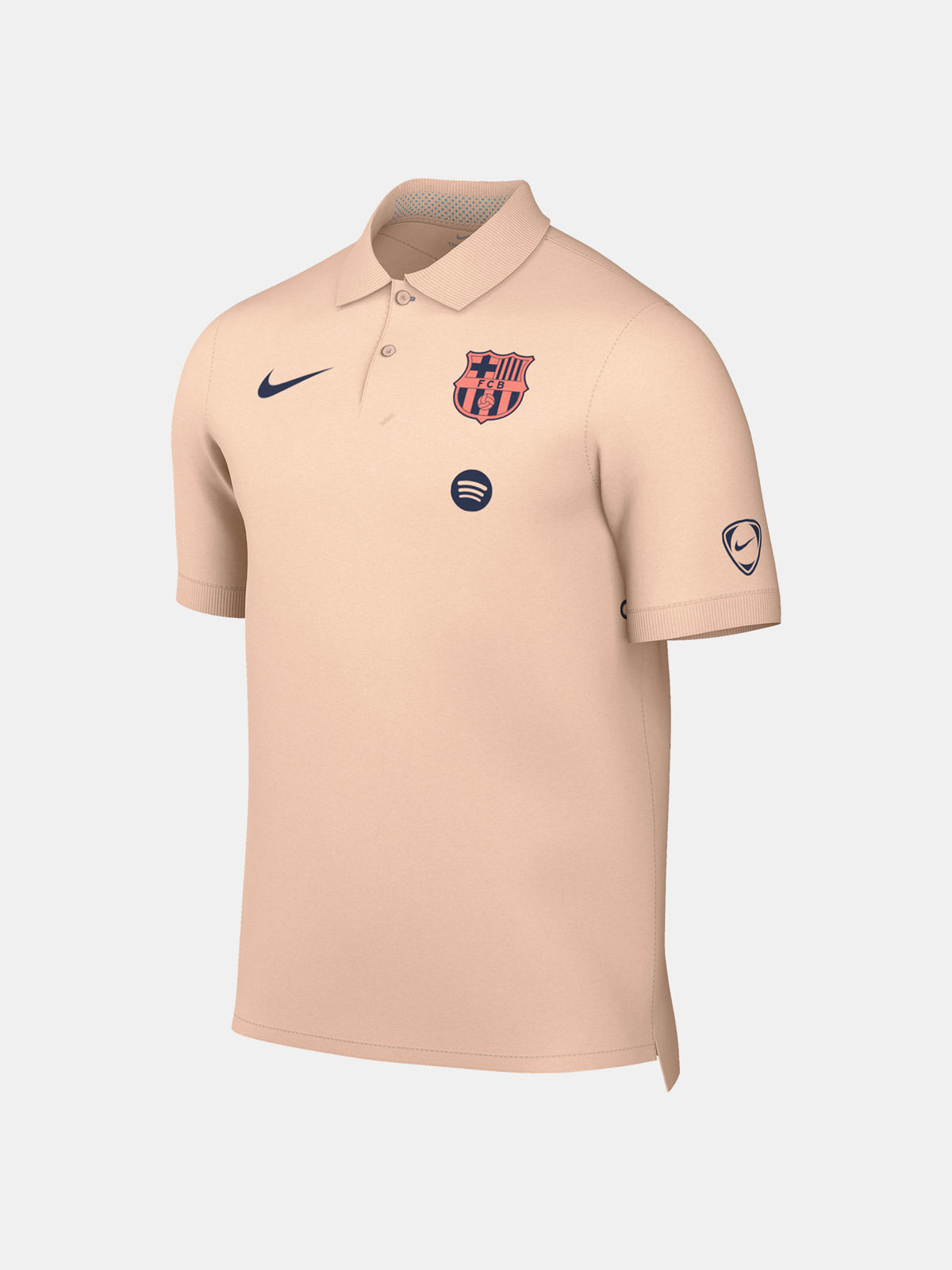 FC Barcelona light peach polo shirt with collar, featuring the club crest and Spotify logo on the chest alongside the Nike swoosh in navy