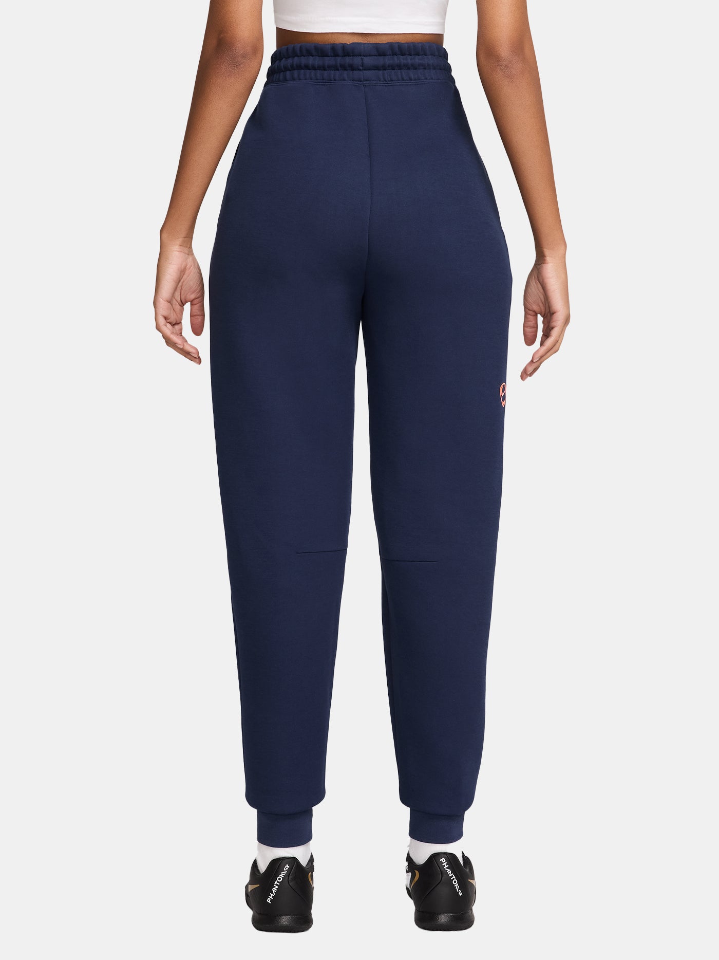 Navy FC Barcelona Nike jogger pants with red crest and Nike swoosh on the front.