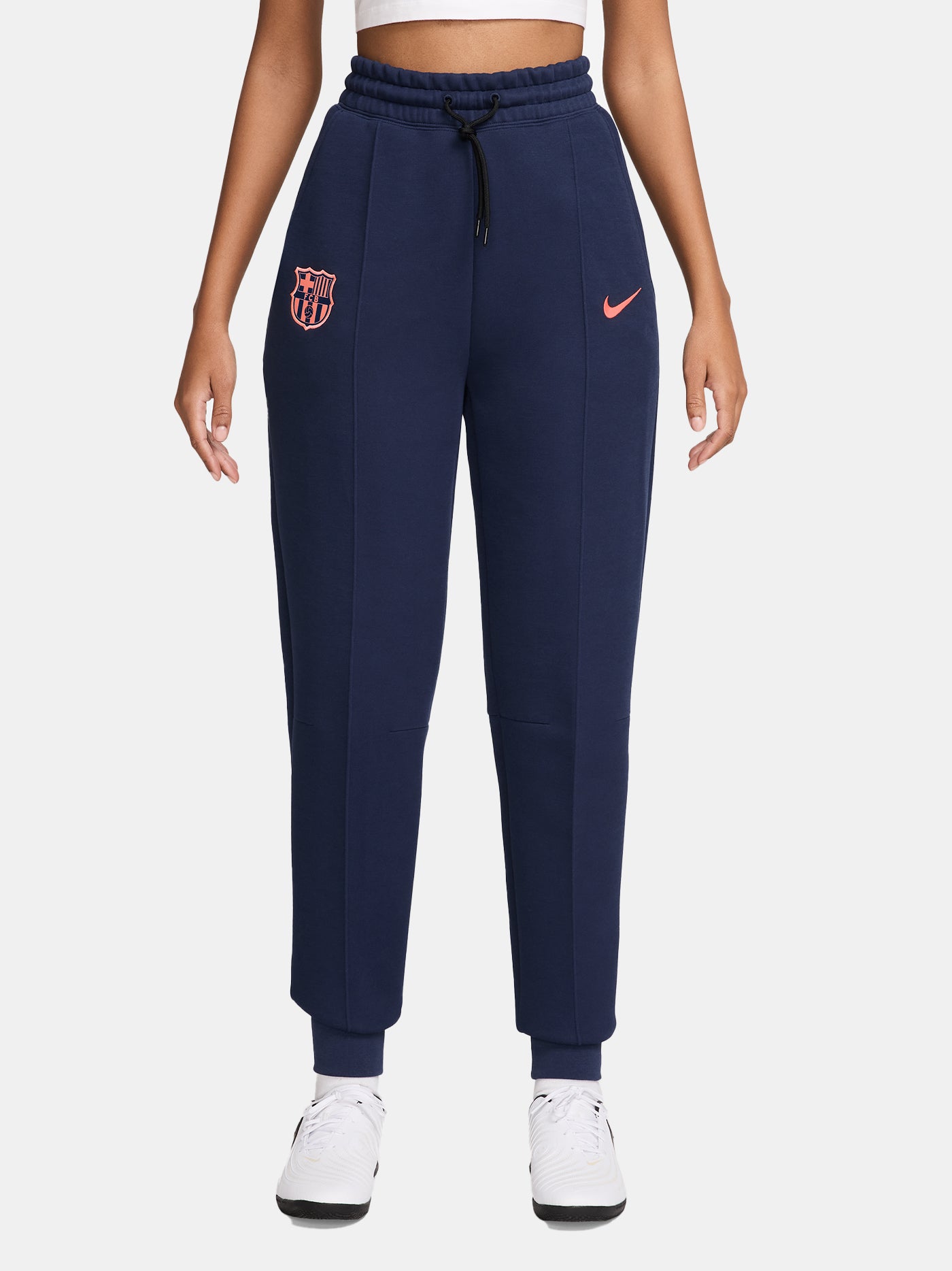 Navy FC Barcelona Nike jogger pants with red crest and Nike swoosh on the front.