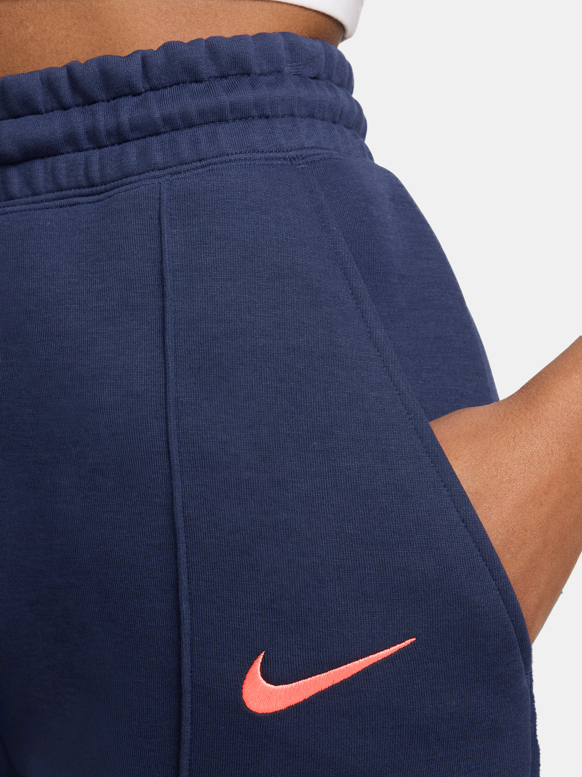 Navy FC Barcelona Nike jogger pants with red crest and Nike swoosh on the front.