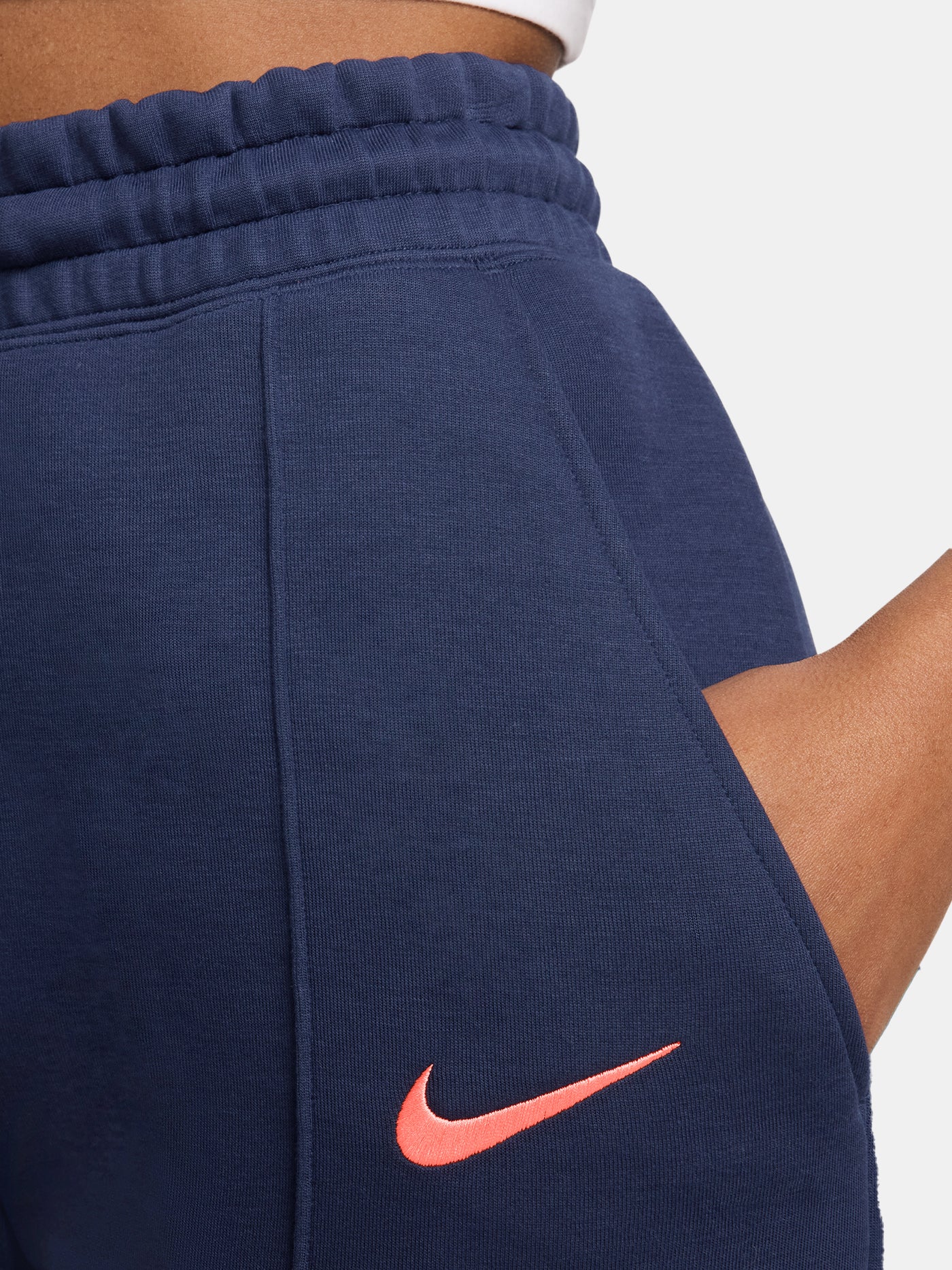 Navy FC Barcelona Nike jogger pants with red crest and Nike swoosh on the front.