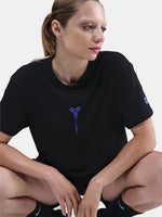 Black FC Barcelona T-shirt with blue Kobe Bryant logo on the chest, paired with black shorts featuring the same emblem.