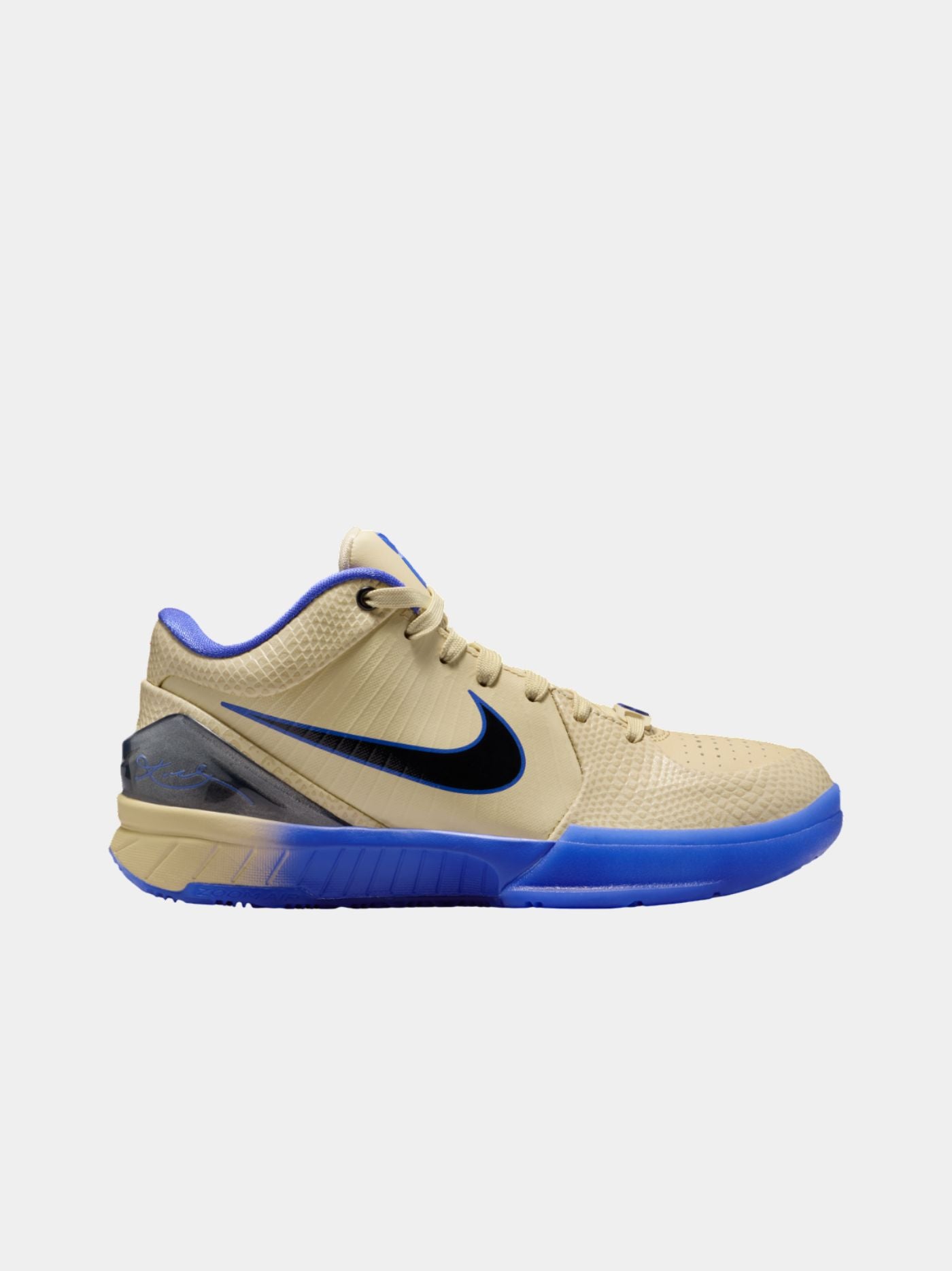 Beige and blue sneaker with a black swoosh logo on a light gray background