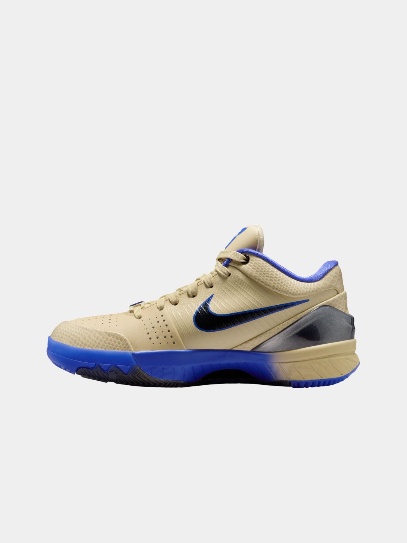 Beige and blue sneaker with Nike logo on a white background