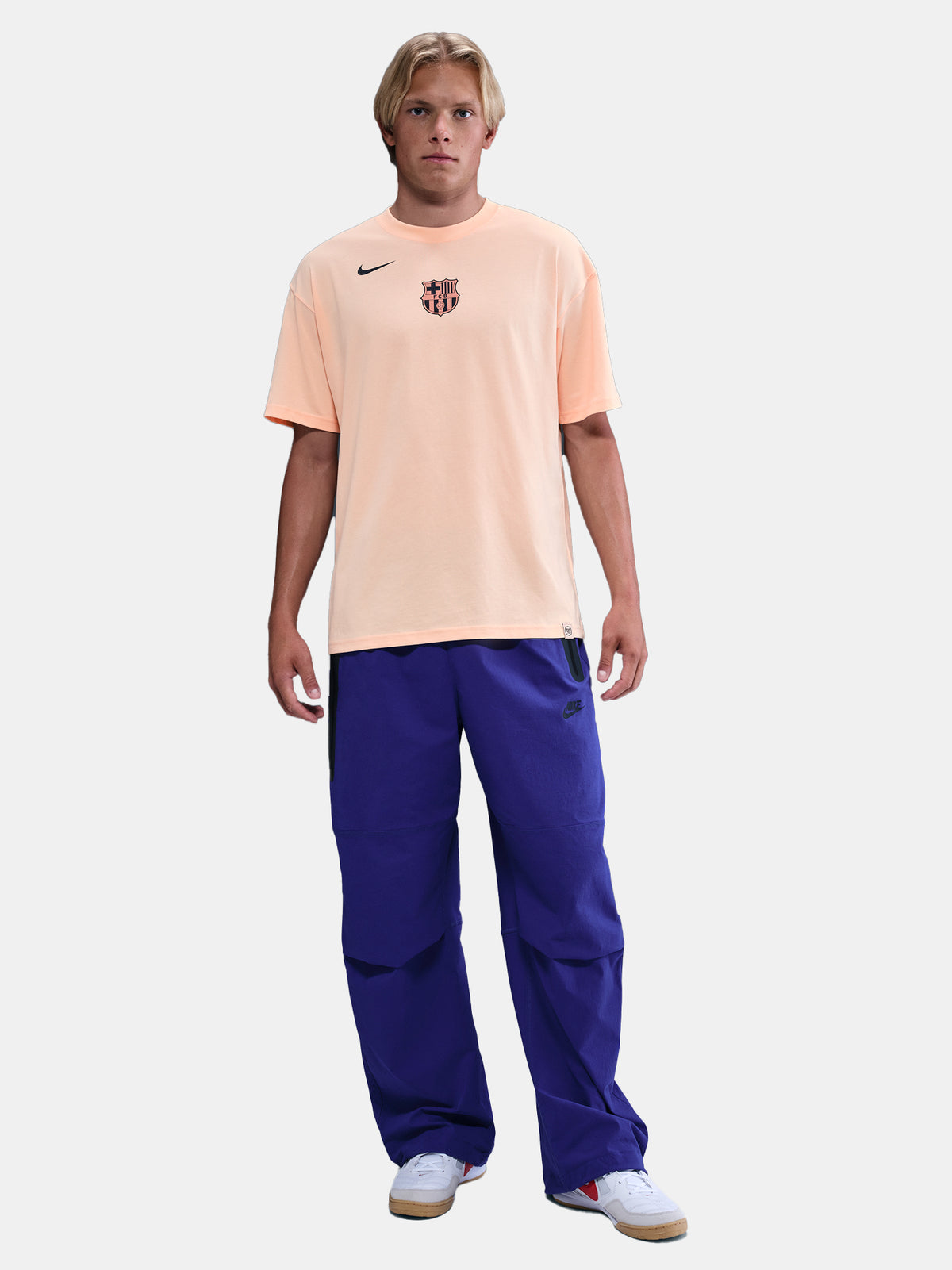 Light peach FC Barcelona Nike t-shirt with short sleeves and club crest on the chest
