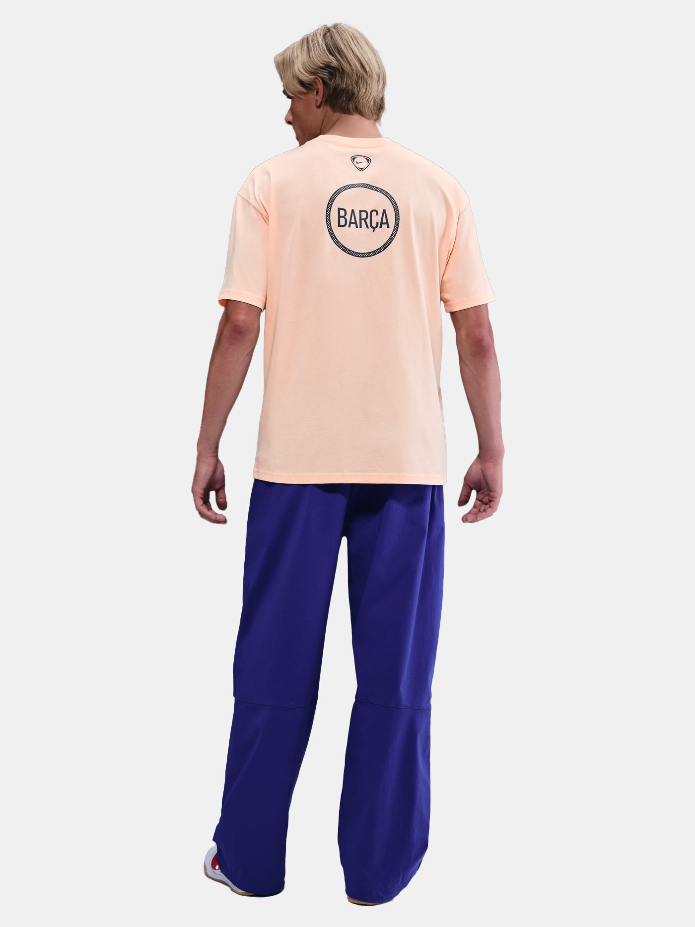 Light peach FC Barcelona Nike t-shirt with short sleeves and club crest on the chest